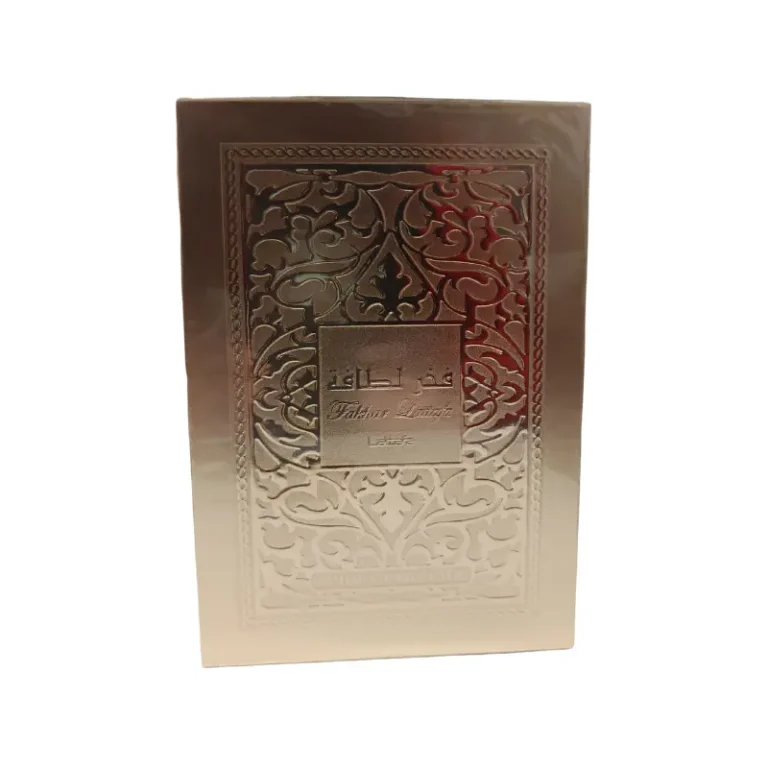 Perfume Lattafa Fakhar Gold, frasco dorado con diseño oriental para hombre.